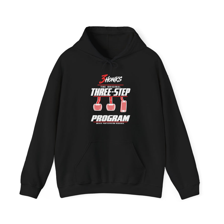 Front of black 3Honks Three-Step Program hoodie with red-and-white logo, three pedals, and Driver Participation Required graphic