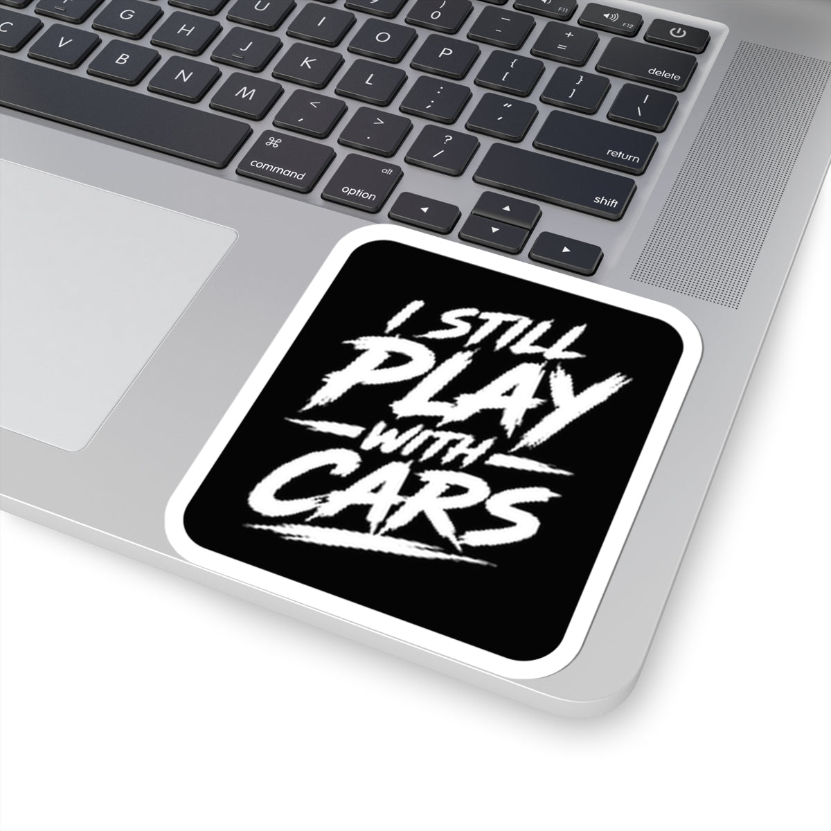 3Honks I Still Play With Cars vinyl sticker with bold white brush lettering on a black background